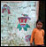 Child in doorway with mural