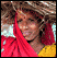 Woman Carrying Feed