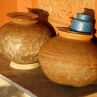 Clay Pitchers partly baked in burning cow dung cakes are commonly used in towns and villages all over India to store cool drinking water. The shapes of pitchers differ from one region to another.