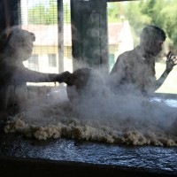 Cooling of Millet and Rice before forming into balls to feed the elephants.